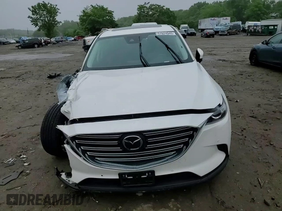 2021 Mazda CX-9 Touring with VIN JM3TCBCY1M0517709, listed as a Copart auction lot 57624945 with 64,081 mi miles and Salvage title. Bid and sale history available at DreamBid. Image 14.