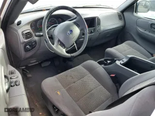 2003 Ford F-150 XL with VIN 1FTRX07243KA29505, listed as a Copart auction lot 79263674 with 188,516 mi miles and Salvage Title. Bid and sale history available at carsss.com. Image 8.