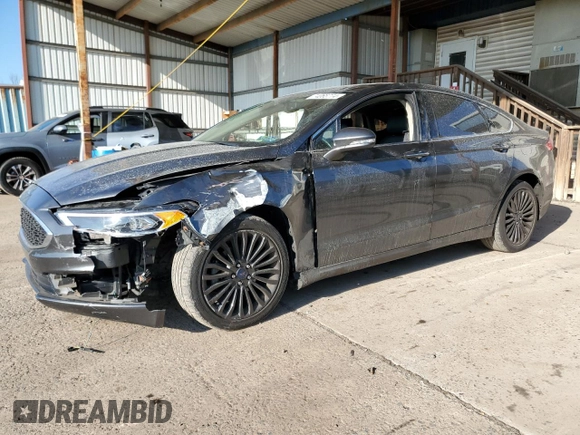2018 Ford Fusion Titanium с VIN 3FA6P0D92JR192382, выставлен на аукционе Copart как лот 74065774 с пробегом 110 411 миль миль и Списание • Salvage title. История ставок и продаж доступна на DreamBid. Изображение 1.