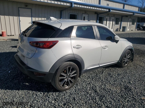 2016 Mazda CX-3 Grand Touring with VIN JM1DKBD70G0106540, listed as a Copart auction lot 45001355 with 233,341 mi miles and Salvage Title. Bid and sale history available at carsss.com. Image 3.