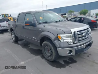 2011 Ford F-150 XLT with VIN 1FTFW1CT8BKD21411, listed as a IAAI auction lot 42077959 with 152,665 mi miles. Bid and sale history available at carsss.com. Image 1.