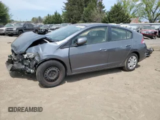 2012 Honda Insight z VIN JHMZE2H34CS006488, wystawiony jako Copart lot #54203575 z przebiegiem Nie podano mil oraz Szkoda całkowita • Salvage title. Historia ofert i sprzedaży dostępna na DreamBid. Obrazek 1.