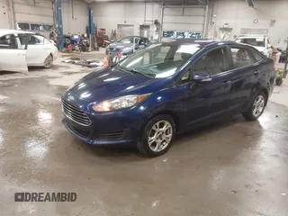 2016 Ford Fiesta SE z VIN 3FADP4BJ0GM112689, wystawiony jako IAAI lot #41231939 z przebiegiem 151 844 mil mil oraz . Historia ofert i sprzedaży dostępna na DreamBid. Obrazek 2.
