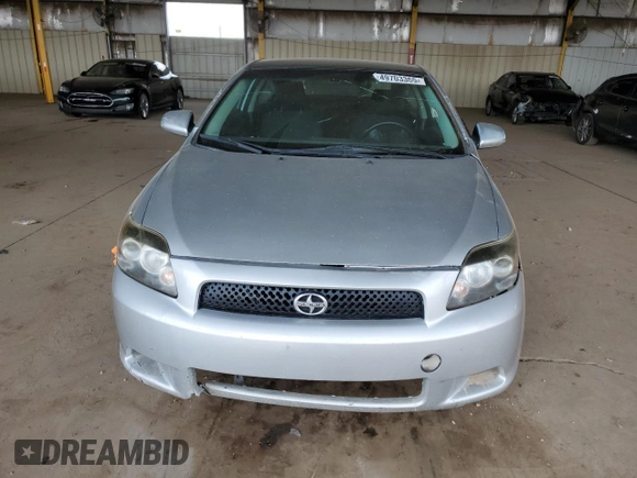 2009 Scion tC with VIN JTKDE167990277992, listed as a Copart auction lot 49703365 with 182,427 mi miles and Salvage Title. Bid and sale history available at carsss.com. Image 5.