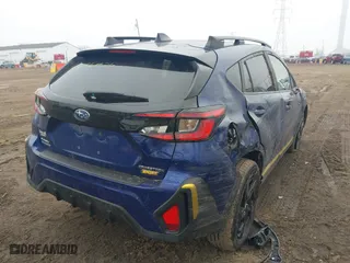 2024 Subaru Crosstrek Sport with VIN 4S4GUHF69R3842324, listed as a IAAI auction lot 41560026 with 3,923 mi miles. Bid and sale history available at carsss.com. Image 4.