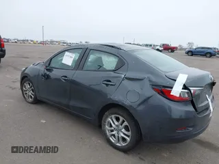 2018 Toyota Yaris with VIN 3MYDLBYV9JY321158, listed as a IAAI auction lot 41937684 with 85,020 mi miles and . Bid and sale history available at DreamBid. Image 3.