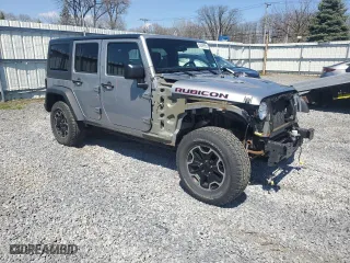 2015 Jeep Wrangler Unlimited Rubicon Hard Rock with VIN 1C4HJWFG2FL686556, listed as a Copart auction lot 54049955 with 126,675 mi miles and Salvage Title. Bid and sale history available at carsss.com. Image 4.