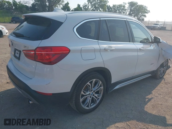 2016 BMW X1 xDrive28i z VIN WBXHT3Z37G4A48242, wystawiony jako IAAI lot #42473404 z przebiegiem 34 309 mil mil oraz . Historia ofert i sprzedaży dostępna na DreamBid. Obrazek 4.