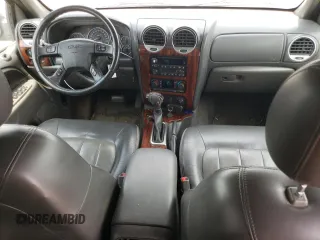 2004 GMC Envoy SLT with VIN 1GKDT13S842439635, listed as a Copart auction lot 63317194 with 201,672 mi miles and Salvage Title. Bid and sale history available at carsss.com. Image 8.