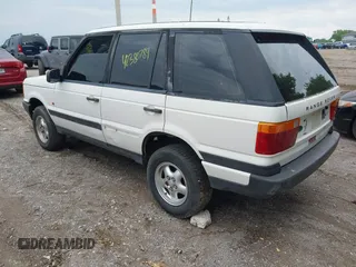 1995 Land Rover Range Rover z VIN SALPV1245SA307854, wystawiony jako IAAI lot #42380784 z przebiegiem 197 000 mil mil oraz . Historia ofert i sprzedaży dostępna na DreamBid. Obrazek 3.