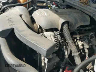 2005 Chevrolet Tahoe LT z VIN 1GNEC13T25J147583, wystawiony jako IAAI lot #42275971 z przebiegiem 244 307 mil mil oraz . Historia ofert i sprzedaży dostępna na DreamBid. Obrazek 12.