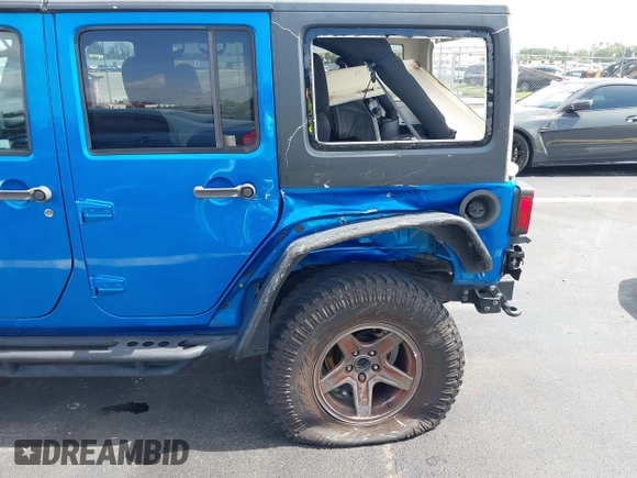 2015 Jeep Wrangler Unlimited Sport with VIN 1C4BJWDG1FL716400, listed as a IAAI auction lot 42645745 with 83,199 mi miles and . Bid and sale history available at DreamBid. Image 6.