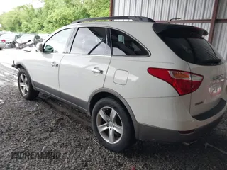 2010 Hyundai Veracruz Limited z VIN KM8NU4CC8AU104085, wystawiony jako IAAI lot #42252720 z przebiegiem 163 312 mil mil oraz . Historia ofert i sprzedaży dostępna na DreamBid. Obrazek 3.