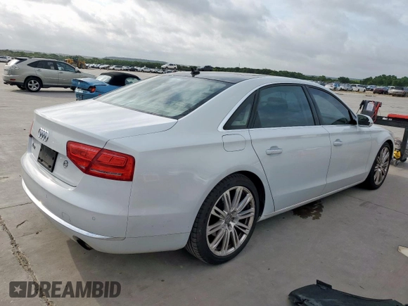 2014 Audi A8 3.0T with VIN WAURGAFD1EN013057, listed as a Copart auction lot 61161595 with 103,560 mi miles and Salvage title. Bid and sale history available at DreamBid. Image 3.