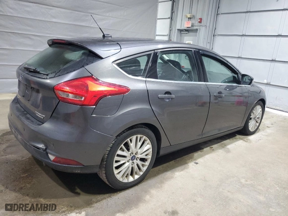 2015 Ford Focus Titanium with VIN 1FADP3N2XFL321128, listed as a Copart auction lot 50796845 with 156,700 mi miles and Clean Title. Bid and sale history available at carsss.com. Image 3.