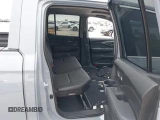 2023 Honda Ridgeline RTL with VIN 5FPYK3F58PB047099, listed as a IAAI auction lot 42313390 with Not provided miles and . Bid and sale history available at DreamBid. Image 8.