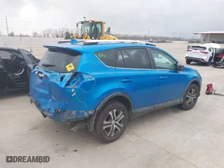 2016 Toyota RAV4 LE with VIN 2T3BFREVXGW420144, listed as a IAAI auction lot 41533171 with 57,002 mi miles. Bid and sale history available at carsss.com. Image 4.