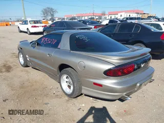 2000 Pontiac Firebird with VIN 2G2FS22K0Y2147688, listed as a IAAI auction lot 41753278 with 166,861 mi miles. Bid and sale history available at carsss.com. Image 3.