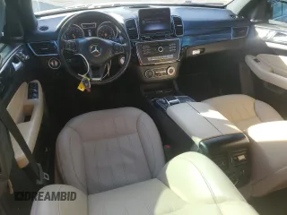 2018 Mercedes-Benz GLS 450 z VIN 4JGDF6EE1JB125310, wystawiony jako Copart lot #87631765 z przebiegiem 143 399 mil mil oraz Szkody całkowita. Historia ofert i sprzedaży dostępna na DreamBid. Obrazek 8.