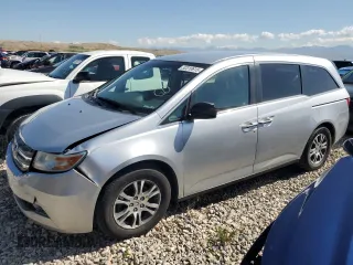 2011 Honda Odyssey EX with VIN 5FNRL5H48BB044352, listed as a Copart auction lot 52310615 with 180,620 mi miles and Salvage Title. Bid and sale history available at carsss.com. Image 1.