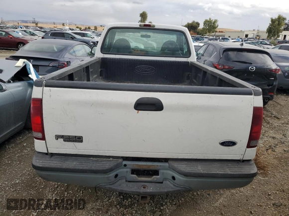 2002 Ford Super Duty F-250 XL with VIN 1FTNF20L02ED31760, listed as a Copart auction lot 79659894 with 236,817 mi miles and Clean Title. Bid and sale history available at carsss.com. Image 6.