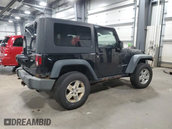 2009 Jeep Wrangler Rubicon with VIN 1J4GA64159L770895, listed as a Copart auction lot 82140864 with 209,464 mi miles and Salvage Title. Bid and sale history available at DreamBid. Image 3.