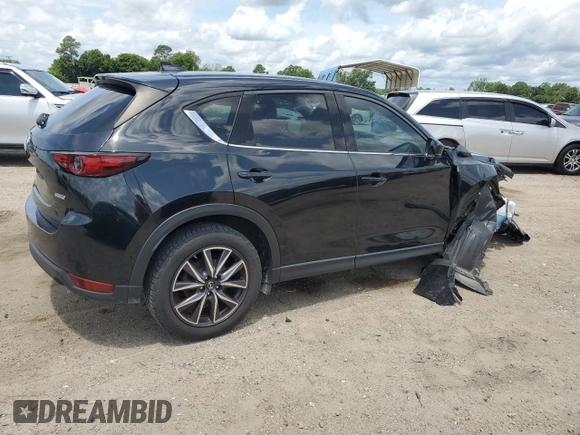 2018 Mazda CX-5 Grand Touring с VIN JM3KFBDM0J0362967, выставлен на аукционе Copart как лот 60288665 с пробегом 137 241 миль миль и Списание • Salvage title. История ставок и продаж доступна на DreamBid. Изображение 3.