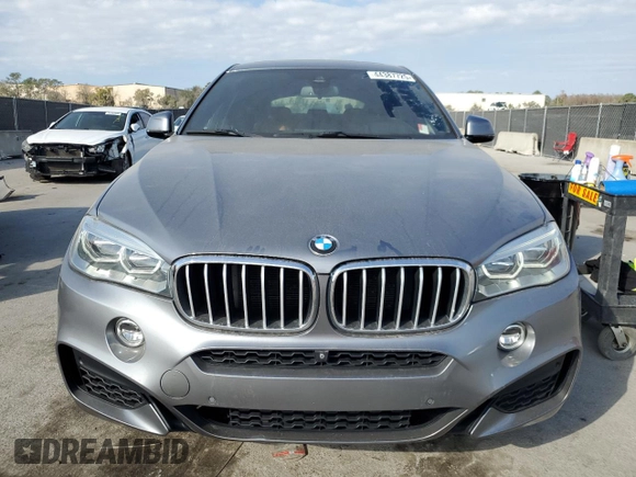 2016 BMW X6 xDrive50i with VIN 5UXKU6C5XG0R34151, listed as a Copart auction lot 44387725 with 158,088 mi miles and Clean Title. Bid and sale history available at carsss.com. Image 5.