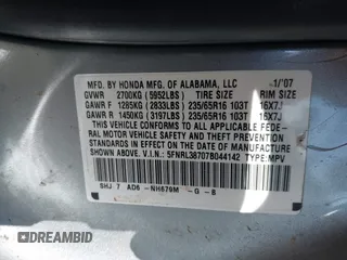 2007 Honda Odyssey EX-L with VIN 5FNRL38707B044142, listed as a IAAI auction lot 42094414 with 173,963 mi miles. Bid and sale history available at carsss.com. Image 9.