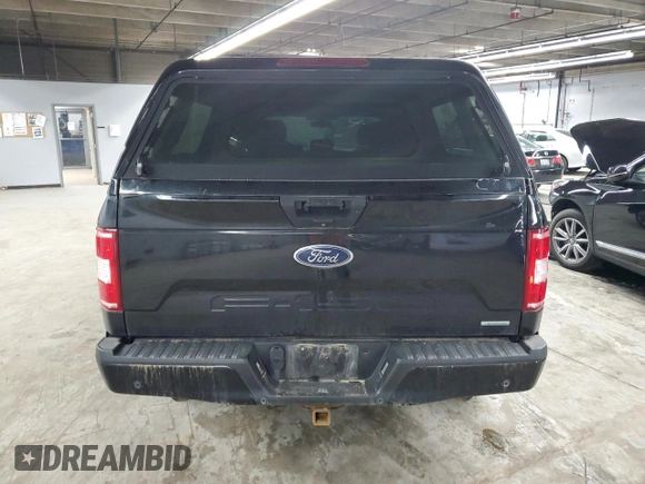 2018 Ford F-150 XL with VIN 1FTEW1EG0JFD10941, listed as a Copart auction lot 57855095 with 119,345 mi miles and Salvage title. Bid and sale history available at DreamBid. Image 6.
