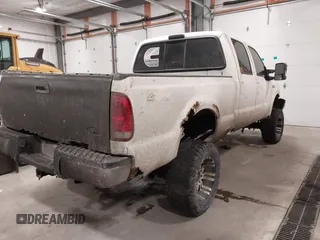 2001 Ford Super Duty F-250 XL with VIN 1FTNW21FX1EA67812, listed as a IAAI auction lot 41380803 with 219,306 mi miles. Bid and sale history available at carsss.com. Image 4.