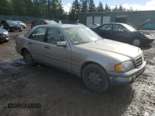 1994 Mercedes-Benz C with VIN WDBHA28E3RF034020, listed as a Copart auction lot 44763115 with 191,734 mi miles and Salvage Title. Bid and sale history available at carsss.com. Image 4.