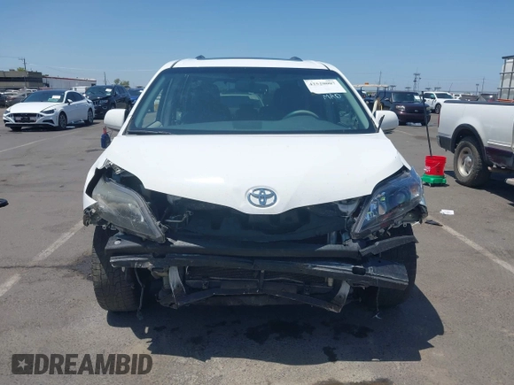 2014 Toyota Sienna SE z VIN 5TDXK3DC0ES515325, wystawiony jako IAAI lot #42520007 z przebiegiem 155 649 mil mil oraz . Historia ofert i sprzedaży dostępna na DreamBid. Obrazek 13.