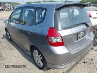 2008 Honda Fit Sport with VIN JHMGD386X8S058659, listed as a IAAI auction lot 42168584 with 210,589 mi miles. Bid and sale history available at carsss.com. Image 3.