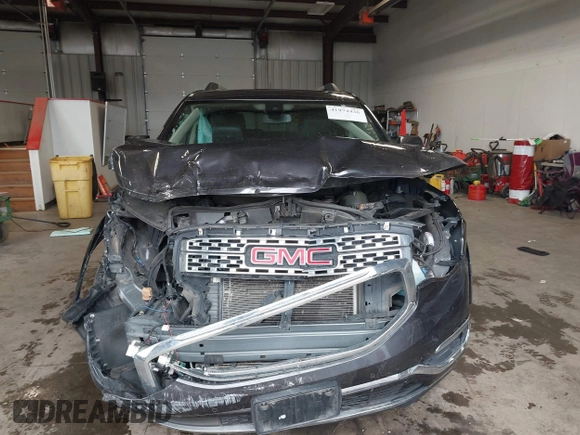 2017 GMC Acadia Denali with VIN 1GKKNXLS1HZ120885, listed as a IAAI auction lot 41974436 with 89,689 mi miles and . Bid and sale history available at carsss.com. Image 13.
