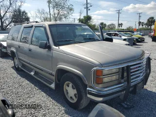 1999 GMC Suburban with VIN 1GKEC16R2XJ700510, listed as a Copart auction lot 45296135 with 189,004 mi miles and Clean Title. Bid and sale history available at carsss.com. Image 4.