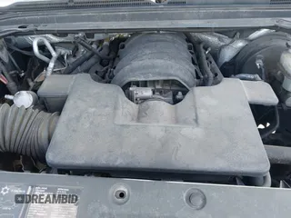2015 Chevrolet Suburban LT z VIN 1GNSKJKC2FR162921, wystawiony jako IAAI lot #41961114 z przebiegiem 296 918 mil mil oraz . Historia ofert i sprzedaży dostępna na DreamBid. Obrazek 10.
