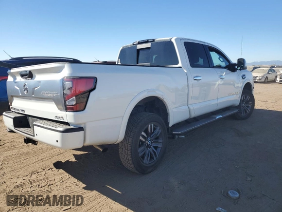 2021 Nissan Titan SV with VIN 1N6AA1FB0MN517885, listed as a Copart auction lot 77046004 with 52,284 mi miles and Salvage title. Bid and sale history available at DreamBid. Image 3.