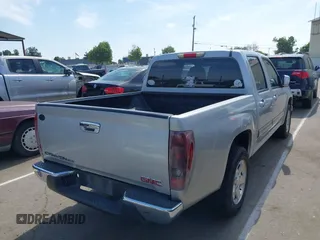 2010 GMC Canyon SLE1 with VIN 1GTDSCDEXA8138621, listed as a IAAI auction lot 42042749 with 169,354 mi miles. Bid and sale history available at carsss.com. Image 4.