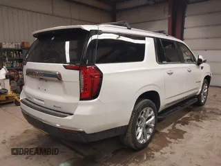 2021 GMC Yukon XL SLT with VIN 1GKS2GKD2MR428489, listed as a IAAI auction lot 41516581 with 69,472 mi miles. Bid and sale history available at carsss.com. Image 4.