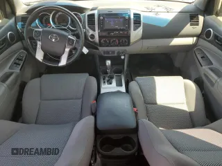 2014 Toyota Tacoma with VIN 3TMLU4EN7EM141763, listed as a Copart auction lot 59393505 with 50,177 mi miles and Salvage title. Bid and sale history available at DreamBid. Image 8.
