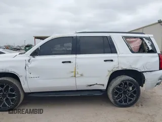 2015 Chevrolet Tahoe LT with VIN 1GNSCBKC4FR530776, listed as a IAAI auction lot 41754350 with 174,694 mi miles and . Bid and sale history available at DreamBid. Image 14.