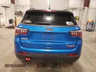 2018 Jeep Compass Trailhawk with VIN 3C4NJDDB3JT234532, listed as a Copart auction lot 55029605 with 99,614 mi miles and Salvage title. Bid and sale history available at DreamBid. Image 6.