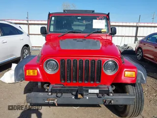 2004 Jeep Wrangler Sport Right Hand Drive with VIN 1J4F449S74P796957, listed as a IAAI auction lot 41987562 with 106,730 mi miles and . Bid and sale history available at carsss.com. Image 12.