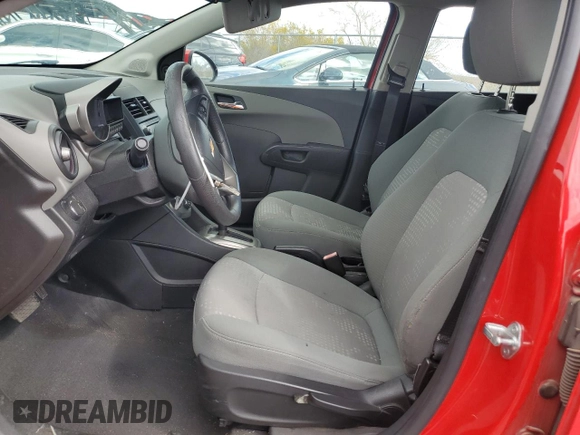 2013 Chevrolet Sonic LS with VIN 1G1JA6SH0D4206336, listed as a Copart auction lot 48973885 with 69,788 mi miles and Salvage title. Bid and sale history available at DreamBid. Image 7.
