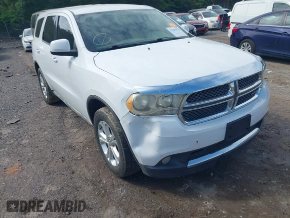 2013 Dodge Durango SXT with VIN 1C4RDJAG4DC512491, listed as a IAAI auction lot 42276406 with 219,766 mi miles and . Bid and sale history available at DreamBid. Image 6.