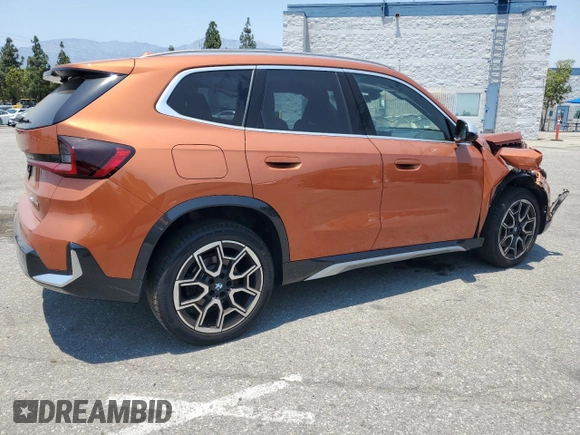 2023 BMW X1 xDrive28i with VIN WBX73EF03P5W54209, listed as a Copart auction lot 64796365 with 19,591 mi miles and Salvage title. Bid and sale history available at DreamBid. Image 3.
