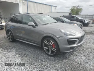 2014 Porsche Cayenne GTS с VIN WP1AD2A22ELA70950, выставлен на аукционе Copart как лот 48324015 с пробегом 75 310 миль миль и На запчасти • Non repairable. История ставок и продаж доступна на DreamBid. Изображение 4.