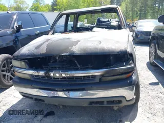 2002 Chevrolet Silverado 1500HD LT z VIN 1GCGC13U42F238816, wystawiony jako IAAI lot #42031587 z przebiegiem Nie podano mil oraz . Historia ofert i sprzedaży dostępna na DreamBid. Obrazek 11.