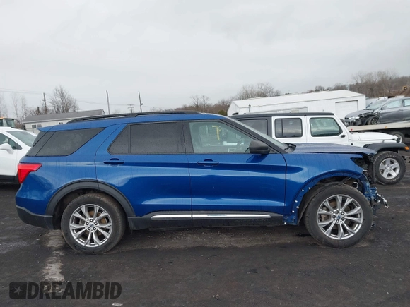 2021 Ford Explorer XLT with VIN 1FMSK8DH7MGA32857, listed as a IAAI auction lot 41877424 with 77,793 mi miles. Bid and sale history available at carsss.com. Image 13.